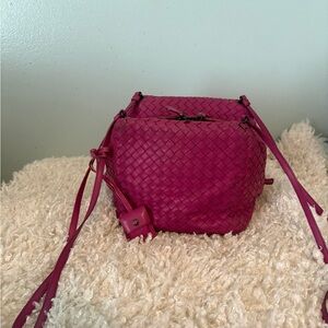 Authentic Bottega Veneta intrecciato woven leather handbag in vibrant pink